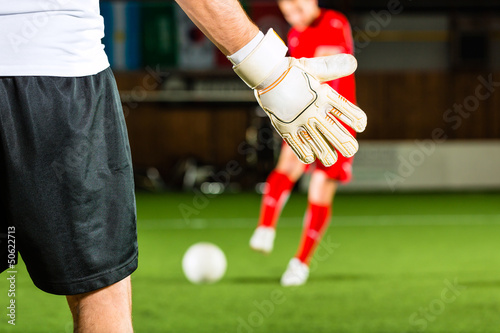 Photo: Man scoring a goal Man scoring a goal