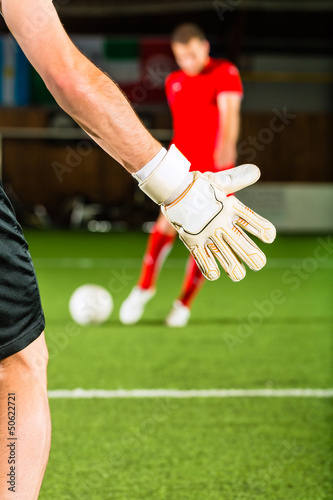 Photo: Man scoring a goal Man scoring a goal