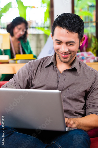 Photo: Fashion designer working at home Fashion designer working at home
