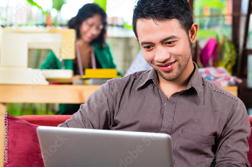 Photo: Fashion designer working at home Fashion designer working at home