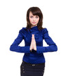 Businesswoman with hands in prayer