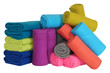 Rolled up bed spreads.