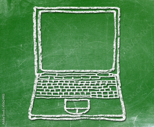 Photo: notebook symbol on blackboard notebook symbol on blackboard