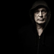 Portrait of the man in a hood
