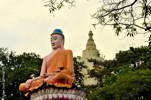 Photo: Meditating Buddha in lotus position Meditating Buddha in lotus position