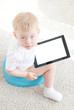 little boy on the chamder with tablet pc