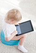 little boy on the chamder with tablet pc