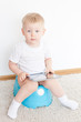 little boy on potty with tablet pc