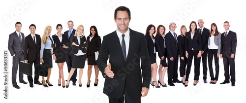 Photo: Portrait of happy businessman and his team Portrait of happy businessman and his team