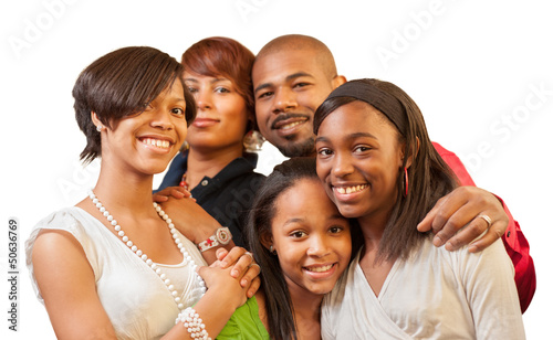 Photo: African American family. Focus on children. African American family. Focus on children.