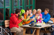 After biking young friends drinking beverage