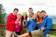 Posing smiling young people with beer outdoors