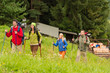 Photo: Smiling young friends hiking on a hill Smiling young friends hiking on a hill