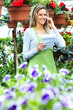 Woman working in nursery.