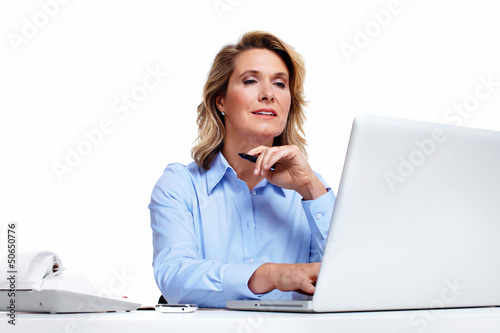Photo: Business woman with a laptop computer. Business woman with a laptop computer.