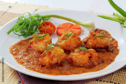 Photo: Fried prawn balls in red curry. Fried prawn balls in red curry.