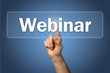 Hand tippt auf Touchscreen Webinar