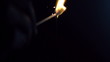 a sparkler being ignited making abstract pattern in slow motion