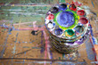 School Paint Mixing Trays Piled on a Board