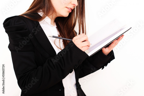 Photo: Mädchen mit Terminkalender Mädchen mit Terminkalender