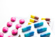 closeup colorful capsules and pills isolated on white background