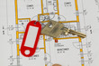 Wohnungsschlüssel und Bauplan