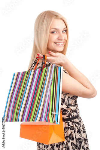 Photo: Beautiful blond woman holding shopping bags Beautiful blond woman holding shopping bags