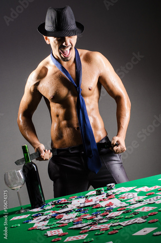 Photo: Naked broke businessman in casino Naked broke businessman in casino