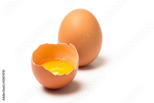 Photo: Two brown eggs isolated on white background Two brown eggs isolated on white background