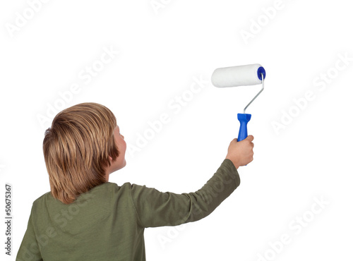 Photo: Adorable child with a paint roller Adorable child with a paint roller