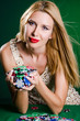 Woman in casino playing cards