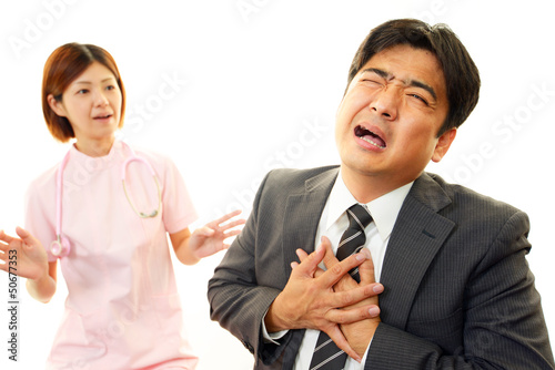 Photo: 痛みを訴える男性 痛みを訴える男性