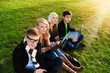 Photo: Four students with laptop Four students with laptop