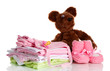 Pile of baby clothes isolated on white