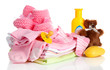 Photo: Pile of baby clothes isolated on white Pile of baby clothes isolated on white