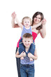 Smiling little boy sits on shoulders of his elder brother