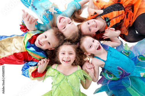 Photo: Four laughing girls and one boy, dressed in fancy dress Four laughing girls and one boy, dressed in fancy dress