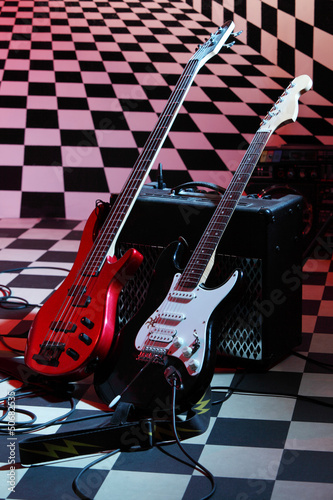Photo: Two electric guitars and sound amplifying equipment Two electric guitars and sound amplifying equipment