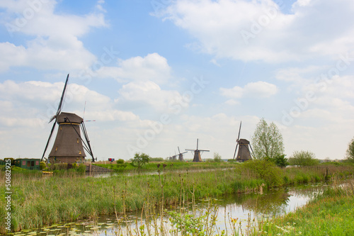 Photo: dutch windmills in summer day dutch windmills in summer day