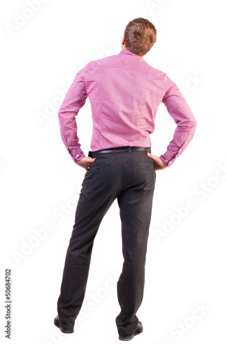 Photo: back view of Business man looks ahead back view of Business man looks ahead