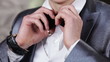 Video: Man adjusts his bow tie Man adjusts his bow tie