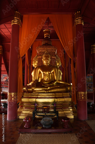Photo: The sitting gold buddha in chapel The sitting gold buddha in chapel