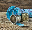 two thimble and measuring tape