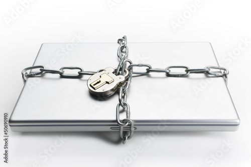 Photo: Chained laptop Chained laptop