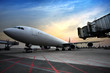 Photo: Passenger planes at the airport in the evening Passenger planes at the airport in the evening