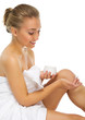 Young woman with body cream