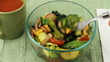 Eating Healthy Salad and Drinking Beverage