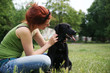 Foto: Young woman and her dog Young woman and her dog