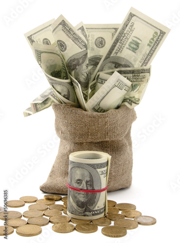 Photo: Canvas money sack with one hundred dollar bills Canvas money sack with one hundred dollar bills