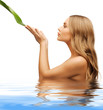woman with green leaf